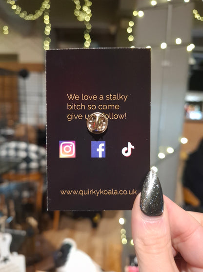 Captain Spalding Pin Badge