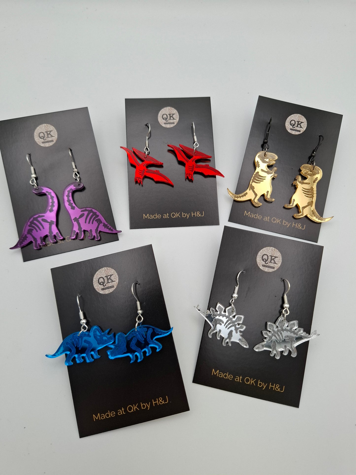 Dinky Dinosaur Metallic Earrings